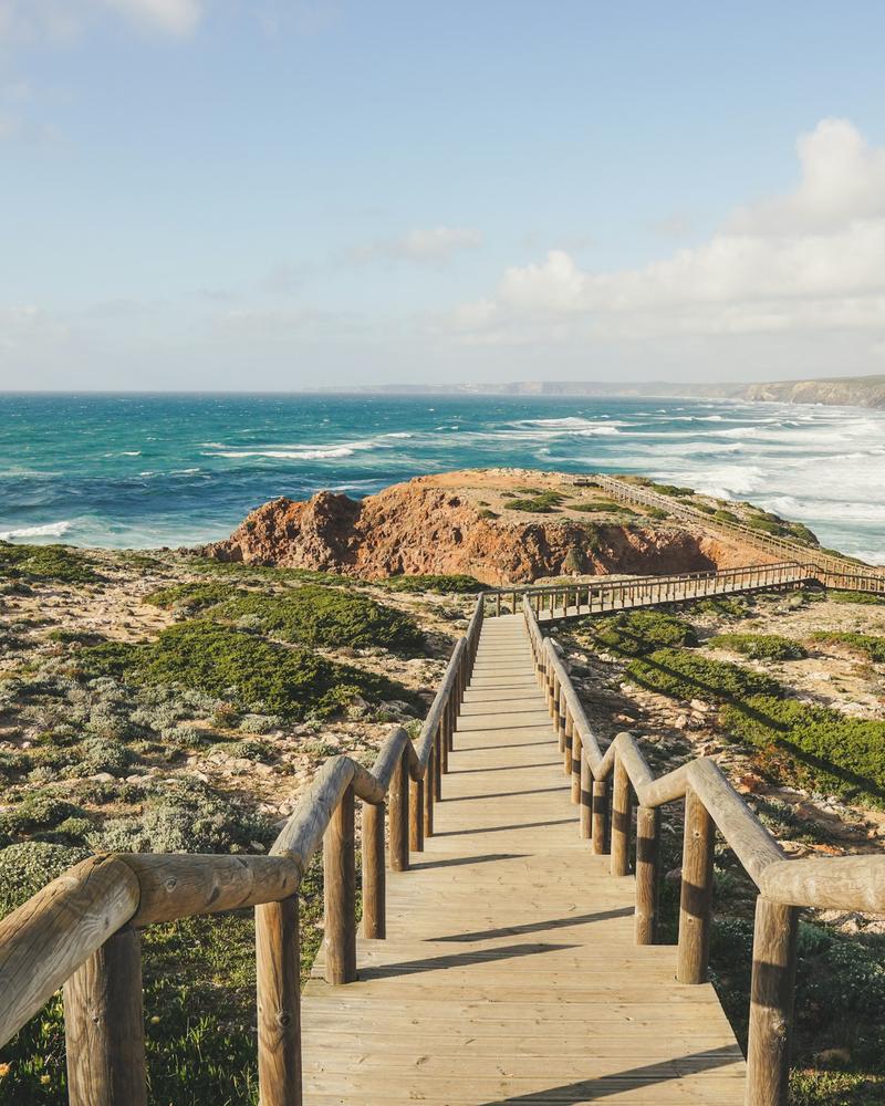 Wooden boardwalk along the Algarve coast in Portugal